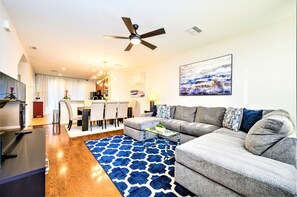 Three-Bedroom Townhouse | Living area | Flat-screen TV, DVD player