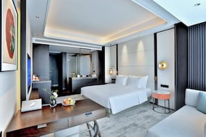 Superior Double Room | Minibar, in-room safe, desk, blackout drapes