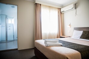 1 bedroom, desk, laptop workspace, iron/ironing board
