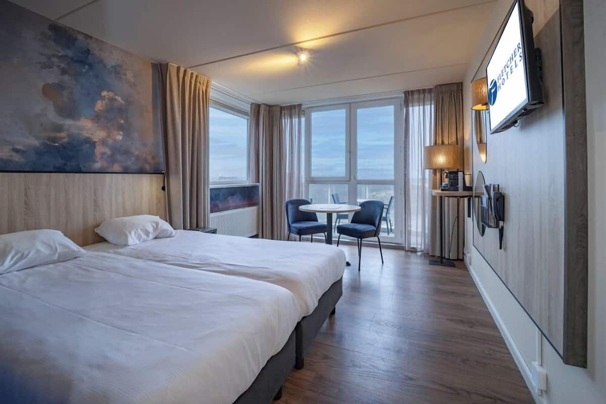 Coffres-forts dans les chambres, Wi-Fi gratuit, draps fournis