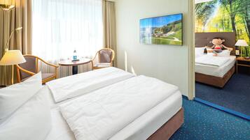 Family Room, 2 Bedrooms, Garden View | Hypo-allergenic bedding, in-room safe, individually decorated