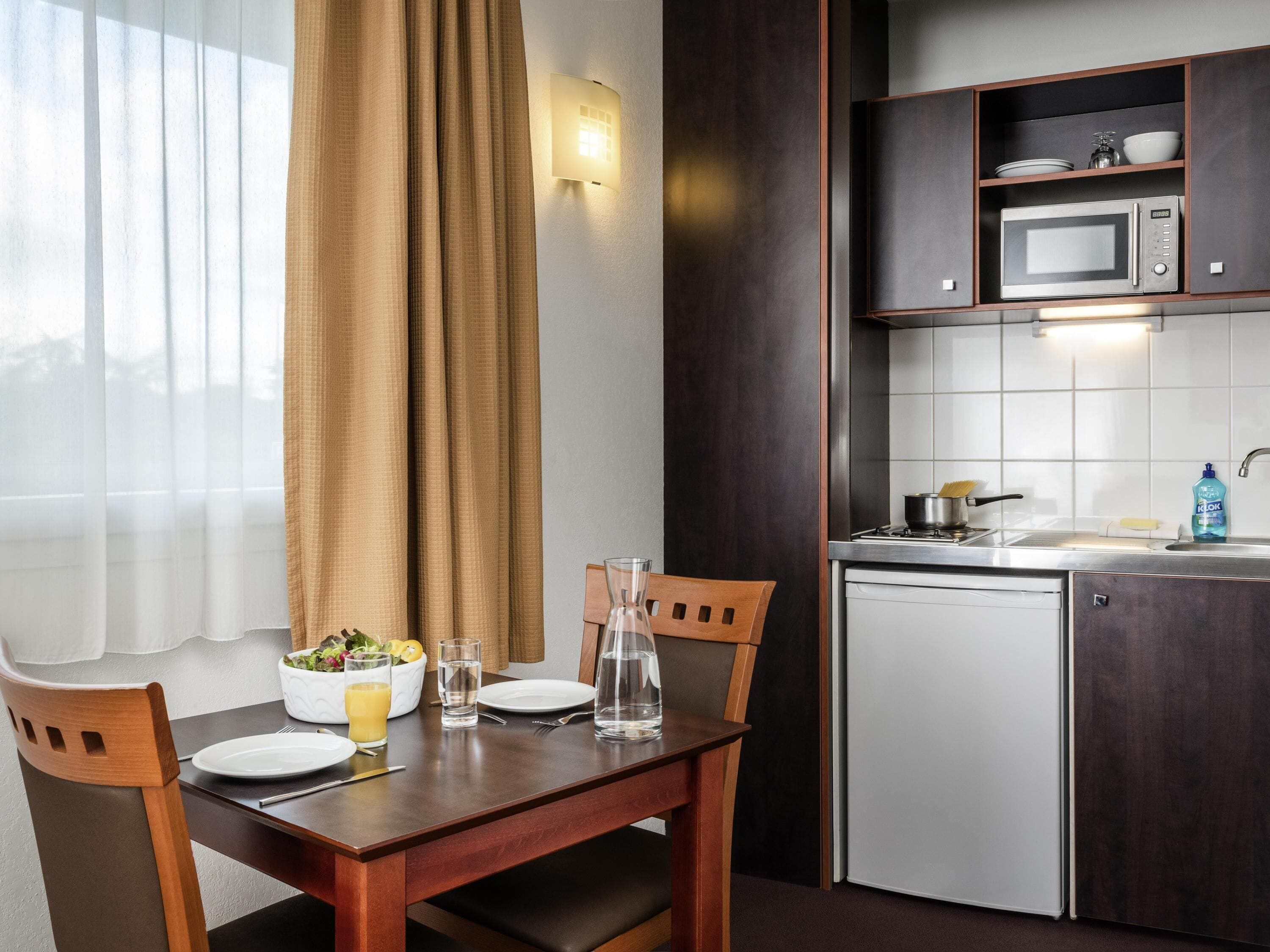 Fridge, microwave, stovetop, coffee/tea maker