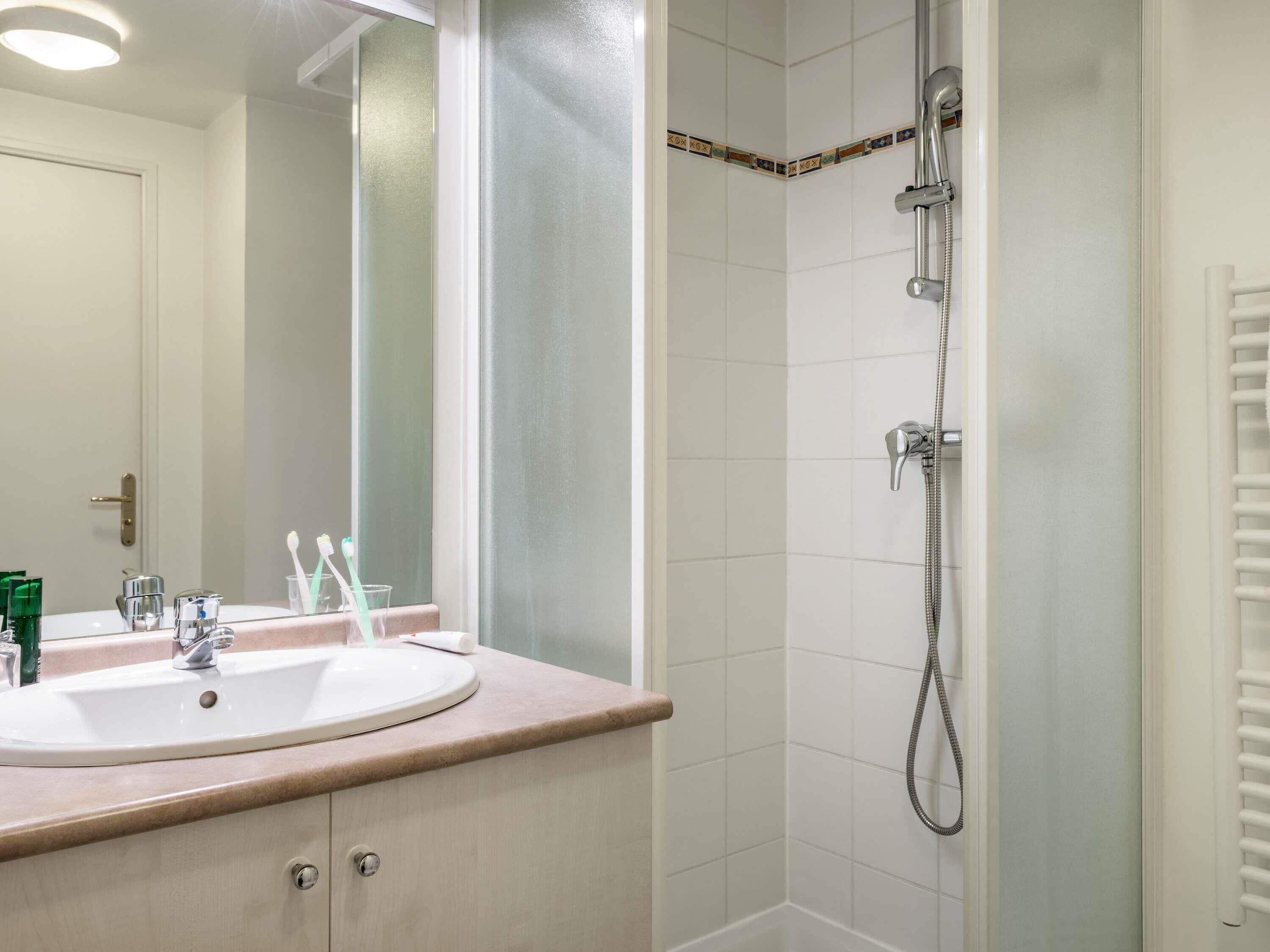 Eco-friendly toiletries, hair dryer, towels