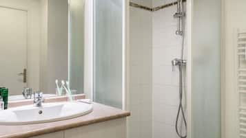 Eco-friendly toiletries, hair dryer, towels