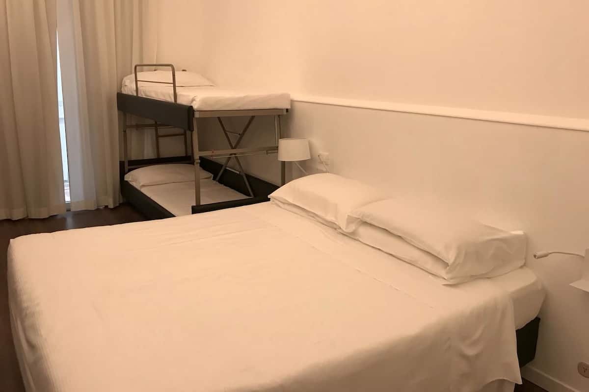 Standard Quadruple Room | Minibar, in-room safe, desk, WiFi (free)
