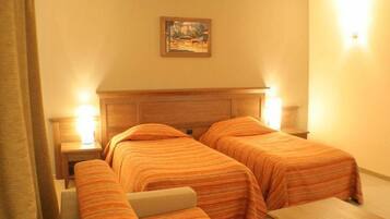 Minibar, desk, blackout drapes, iron/ironing board