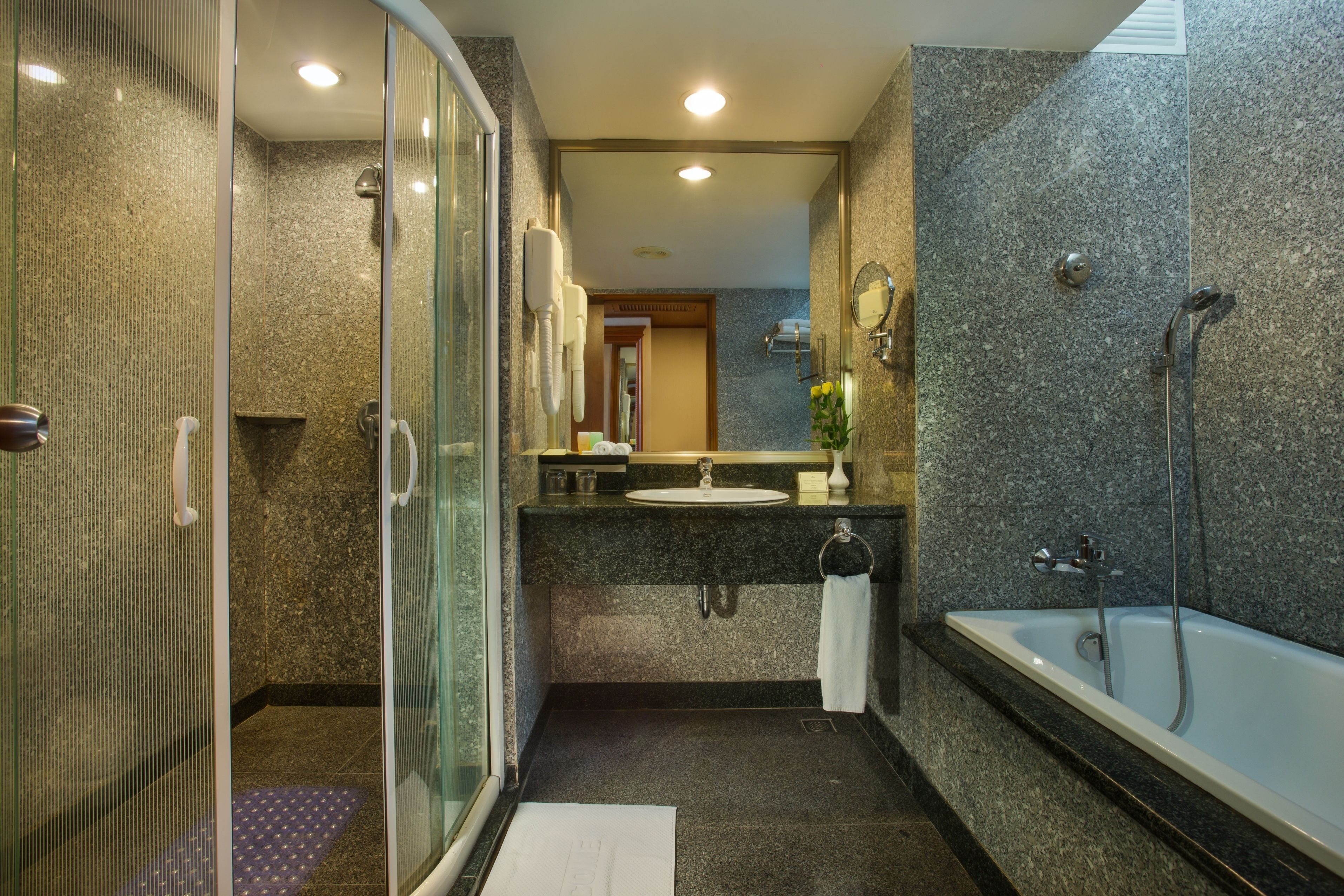 separate bathtub and shower, deep-soaking bathtub, rainfall showerhead