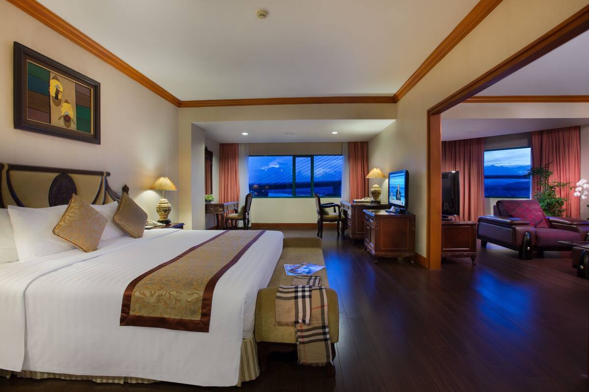 executive suite with sea view, 1 king bed | living room | 40-inch lcd tv with satellite channels, tv, smart speakers