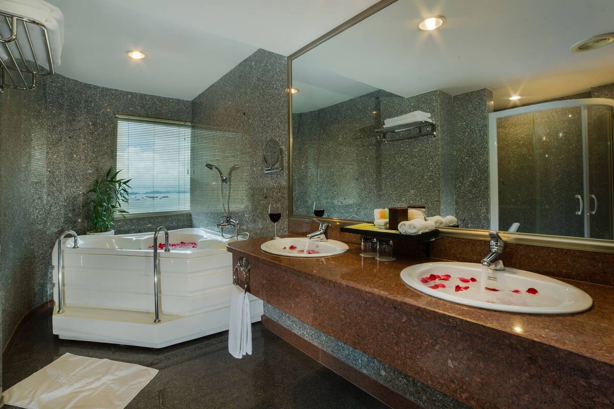separate bathtub and shower, deep-soaking bathtub, rainfall showerhead