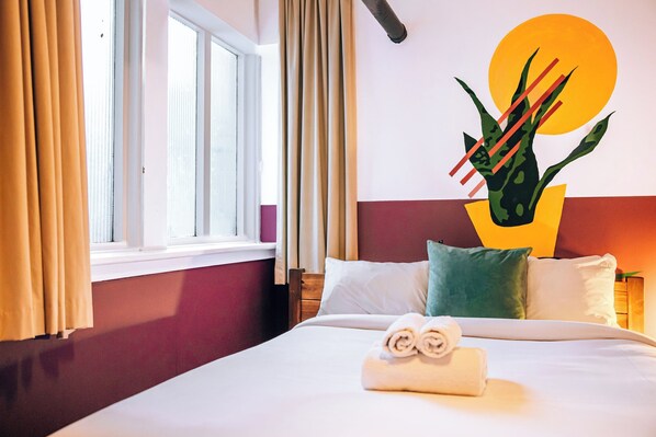 Economy Room | Individually decorated, individually furnished, free WiFi, bed sheets