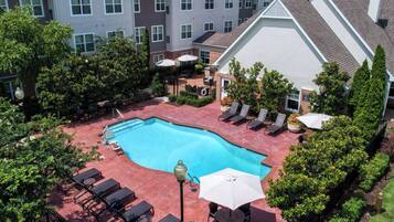 Seasonal outdoor pool, open 10 AM to 10 PM, pool umbrellas