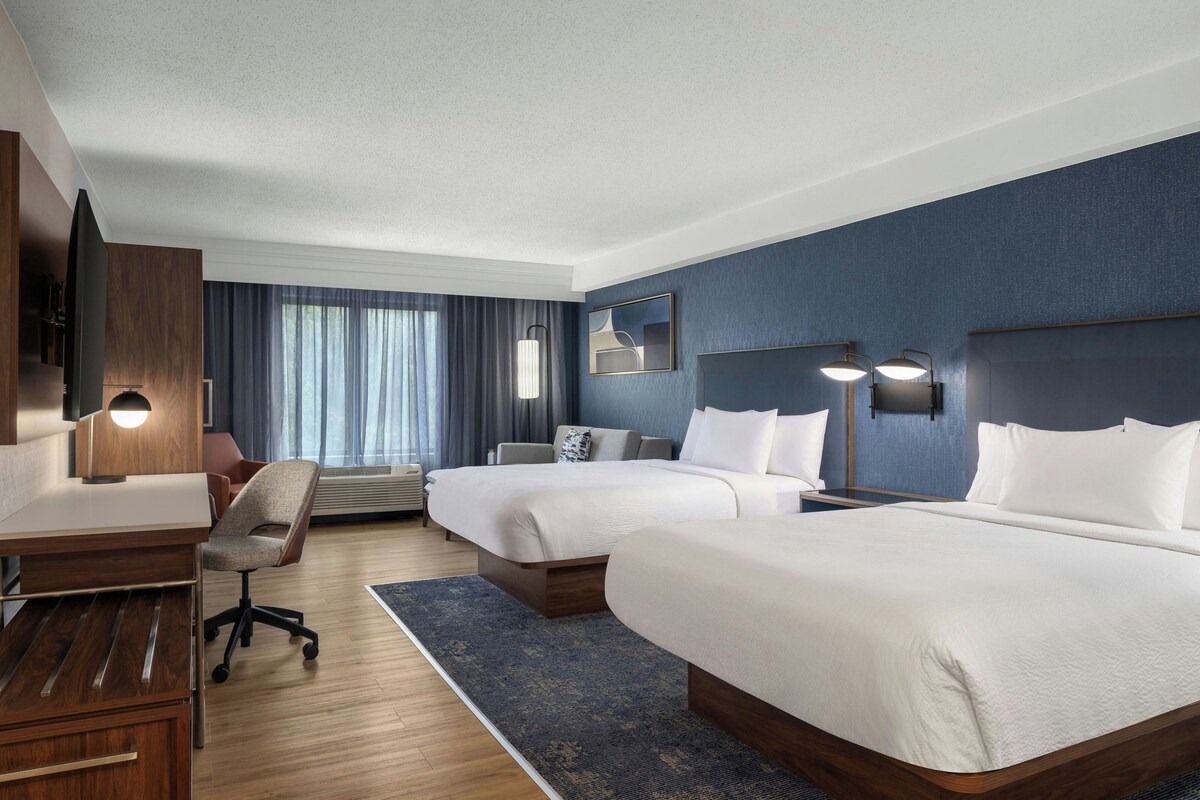 Deluxe Room, Multiple Beds | Premium bedding, desk, blackout drapes, iron/ironing board