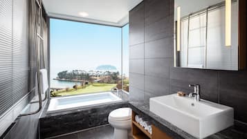 Separate tub and shower, rainfall showerhead, free toiletries