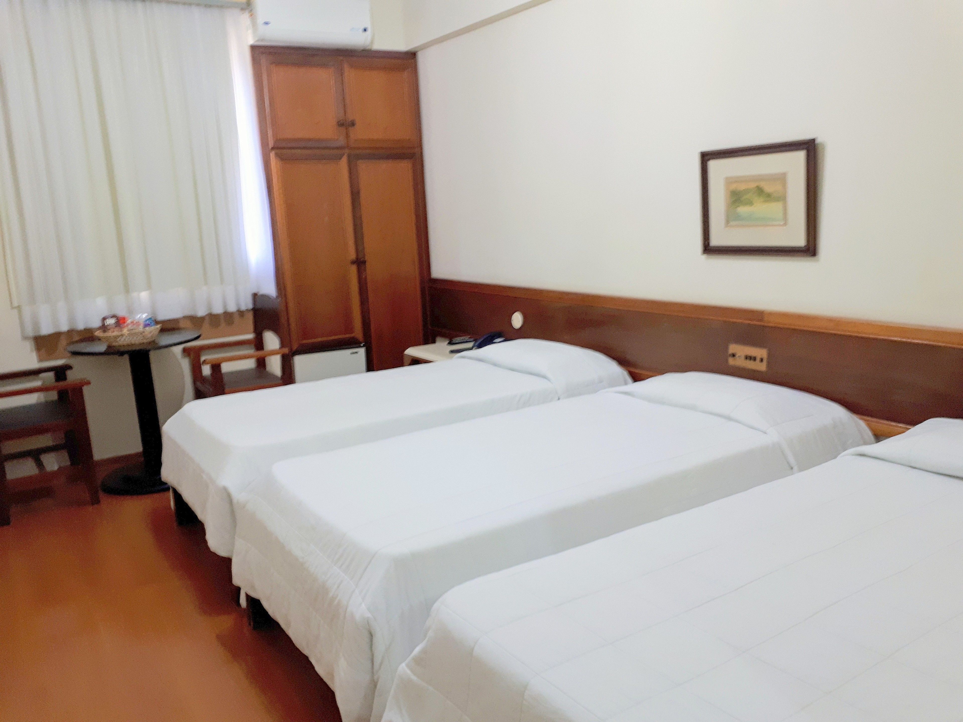 Triple Room | Minibar, desk, blackout drapes, free WiFi