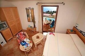 Italiaanse Frette-lakens, een minibar, een kluis op de kamer, een bureau