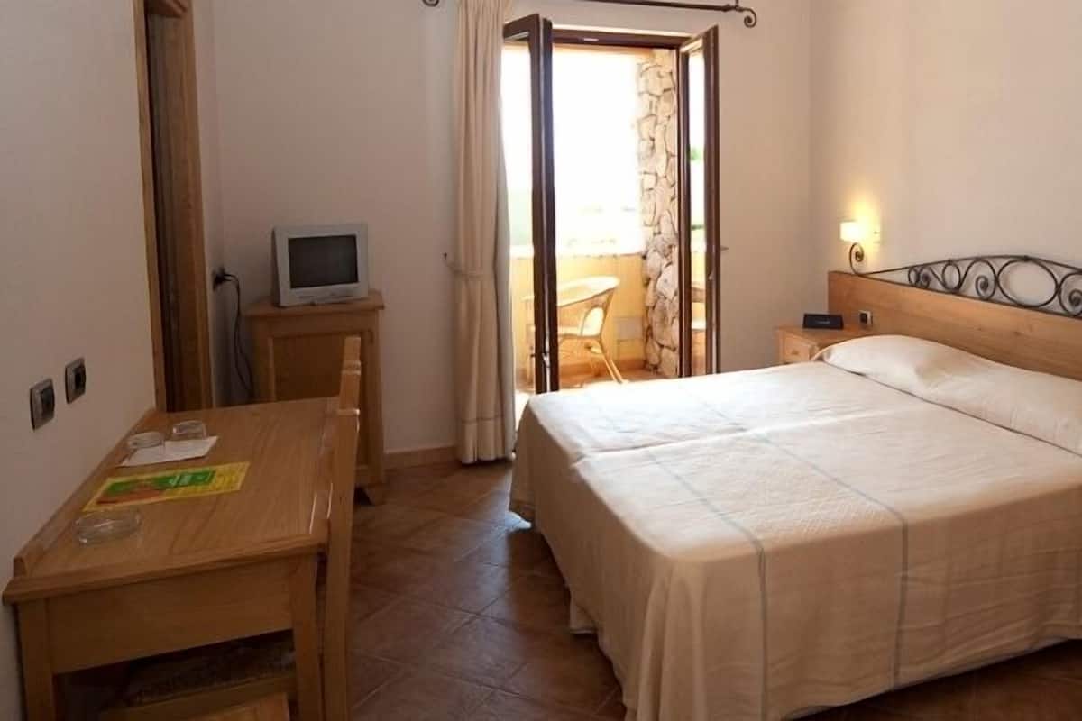 Sábanas italianas Frette, minibar y caja de seguridad en la habitación
