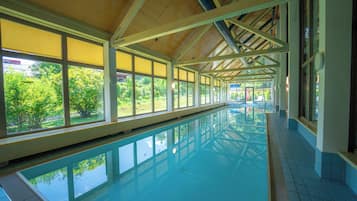 Indoor pool, open 2:00 PM to 8:00 PM, pool loungers