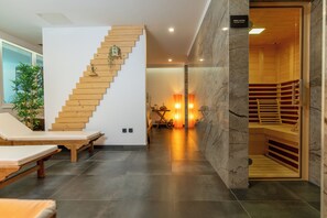 Sauna, massages des tissus profonds, massages