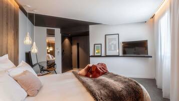 Ropa de cama de alta calidad y minibar