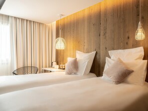 Ropa de cama de alta calidad y minibar 