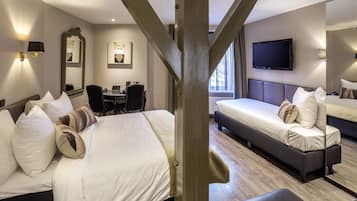 Surmatelas, minibar, coffres-forts dans les chambres