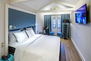 Colchones con pillow-top, minibar y caja de seguridad en la habitación 