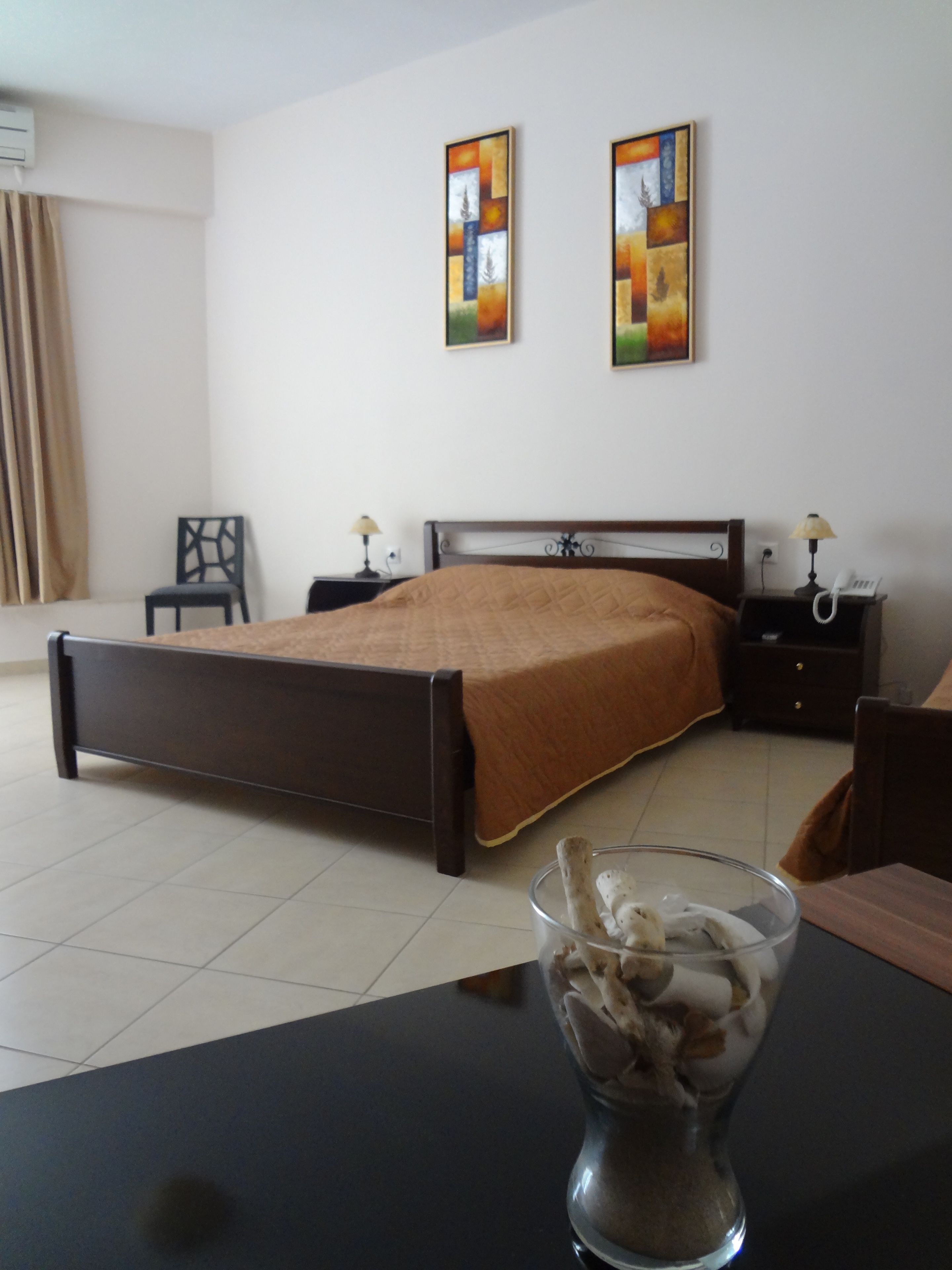 triple room, garden view | 1 bedroom, in-room safe, desk, iron/ironing board