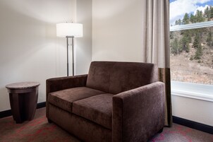 Lady Luck Deluxe Room King Sofa Non-Smoking | Living area | 32-inch LCD TV with cable channels, TV, pay movies