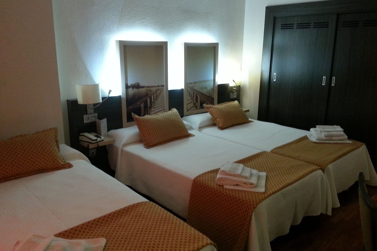 triple room | minibar, in-room safe, desk, blackout curtains