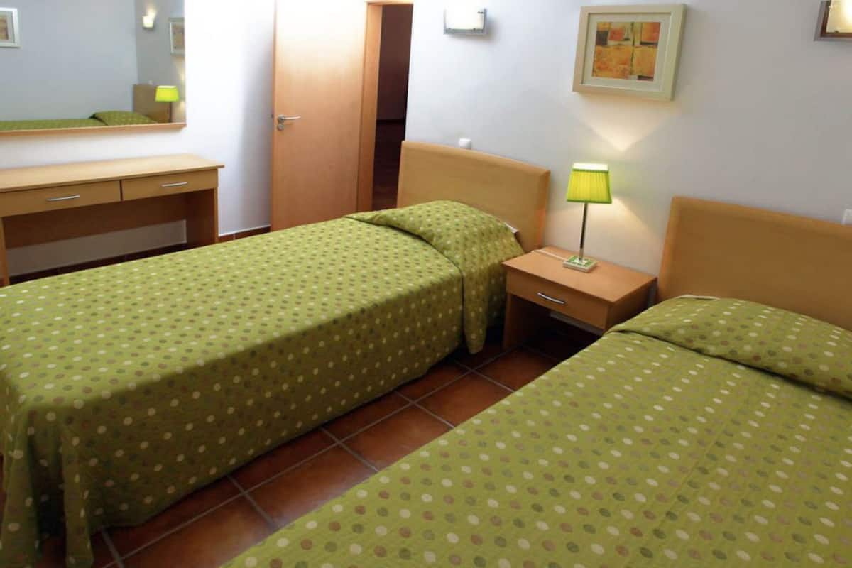 Iron/ironing board (on request), WiFi (surcharge), bed sheets