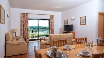 Apartment, 4 Bedrooms | Living room | TV