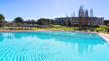 Outdoor pool, pool umbrellas, pool loungers