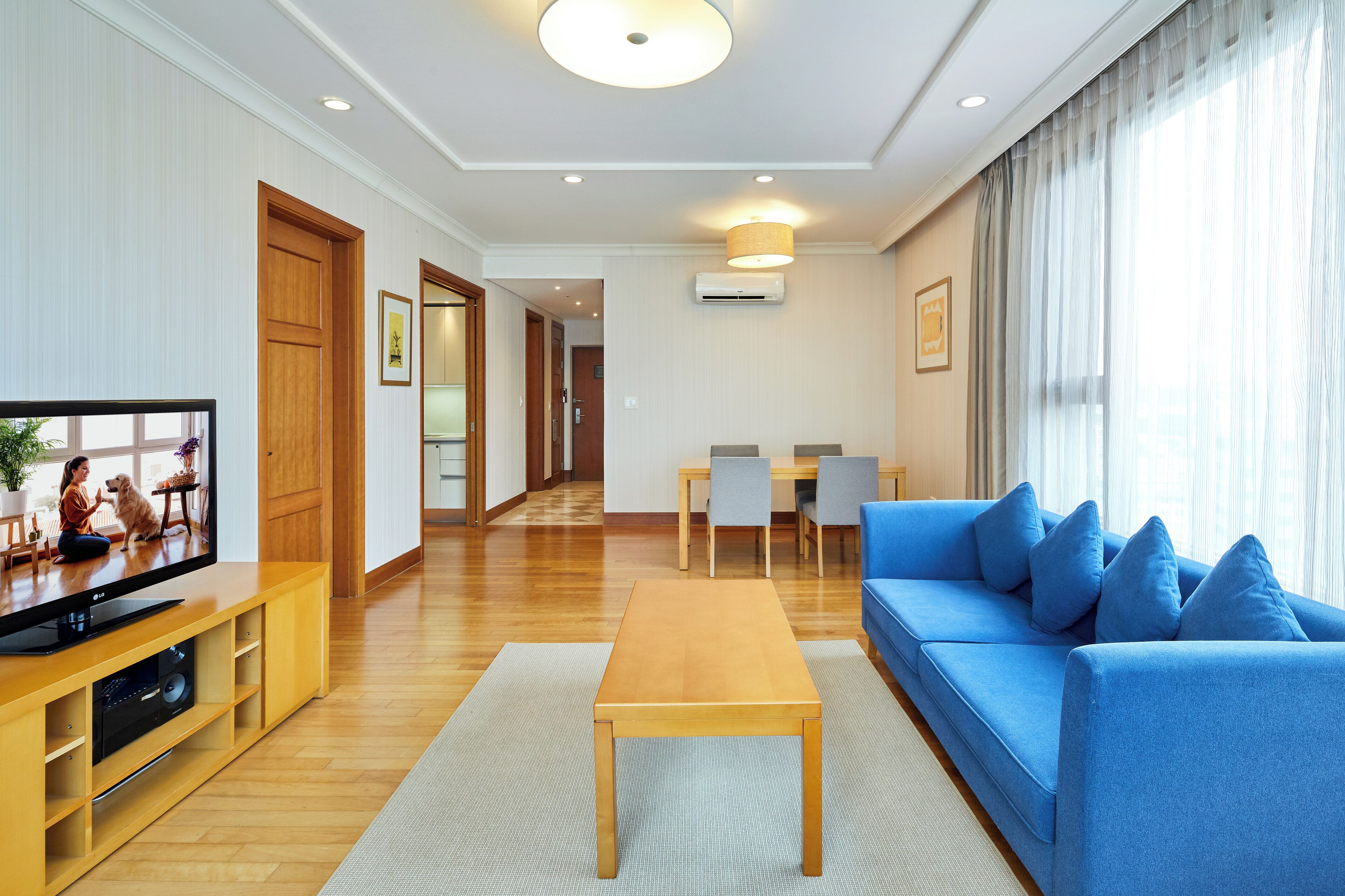 Executive Room, 2 Bedrooms | Living area | TV, heated floors