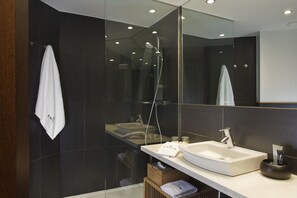 Designer toiletries, hair dryer, towels, soap