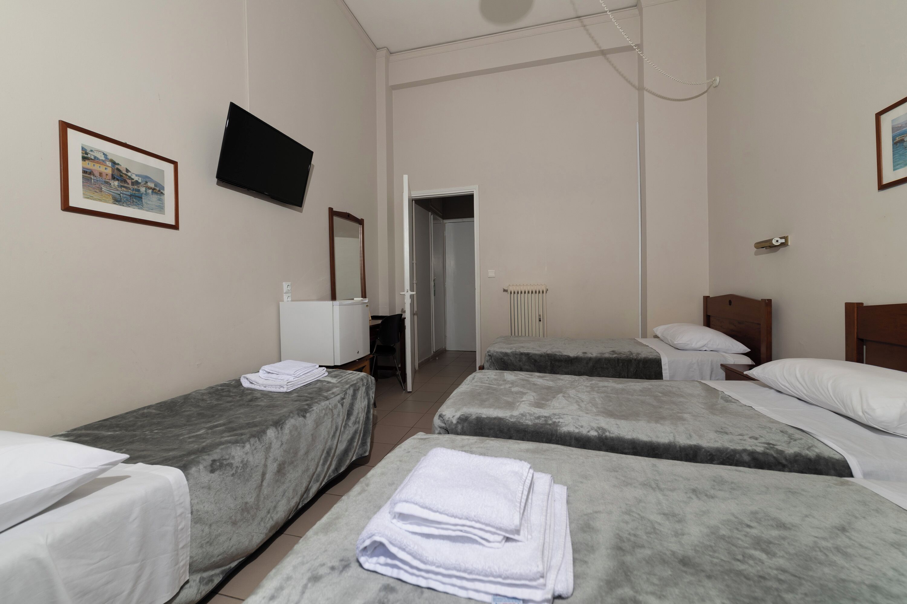 Hypo-allergenic bedding, desk, blackout drapes, iron/ironing board