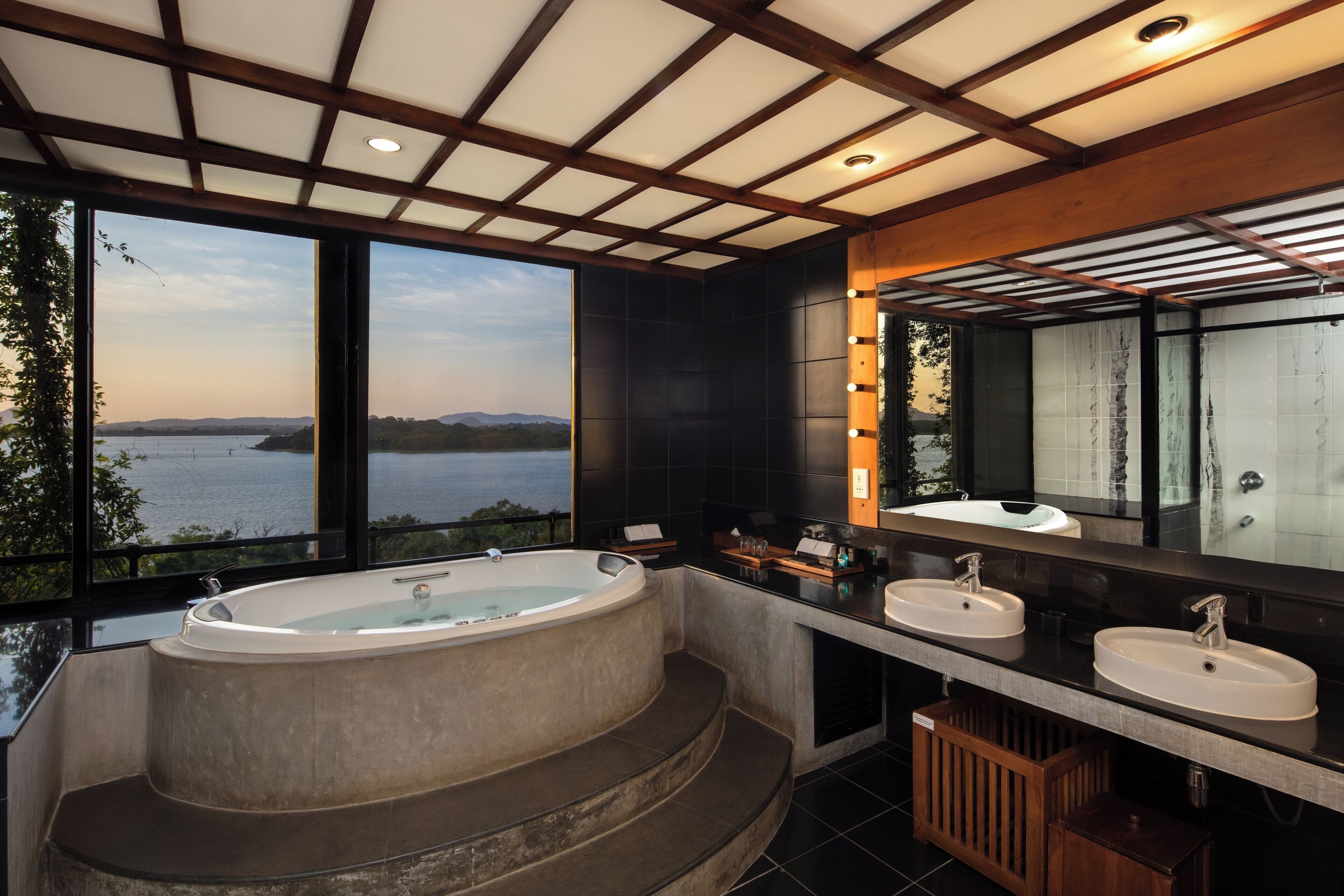 luxury suite | bathroom | rainfall showerhead, free toiletries, hair dryer, bathrobes