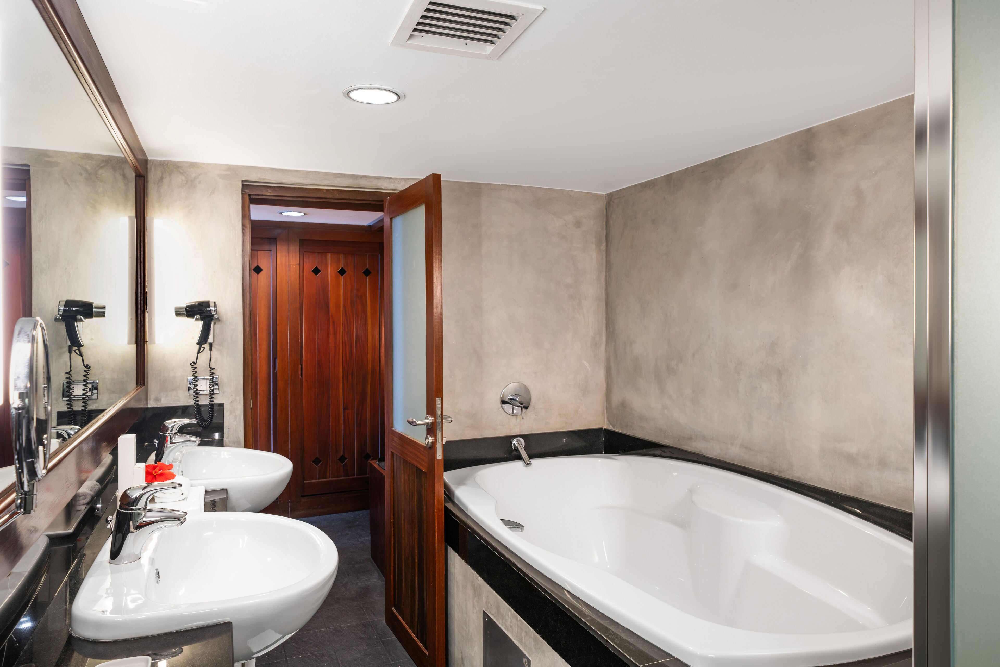 Luxury Suite, 1 King Bed | Bathroom | Designer toiletries, hair dryer, bathrobes, slippers