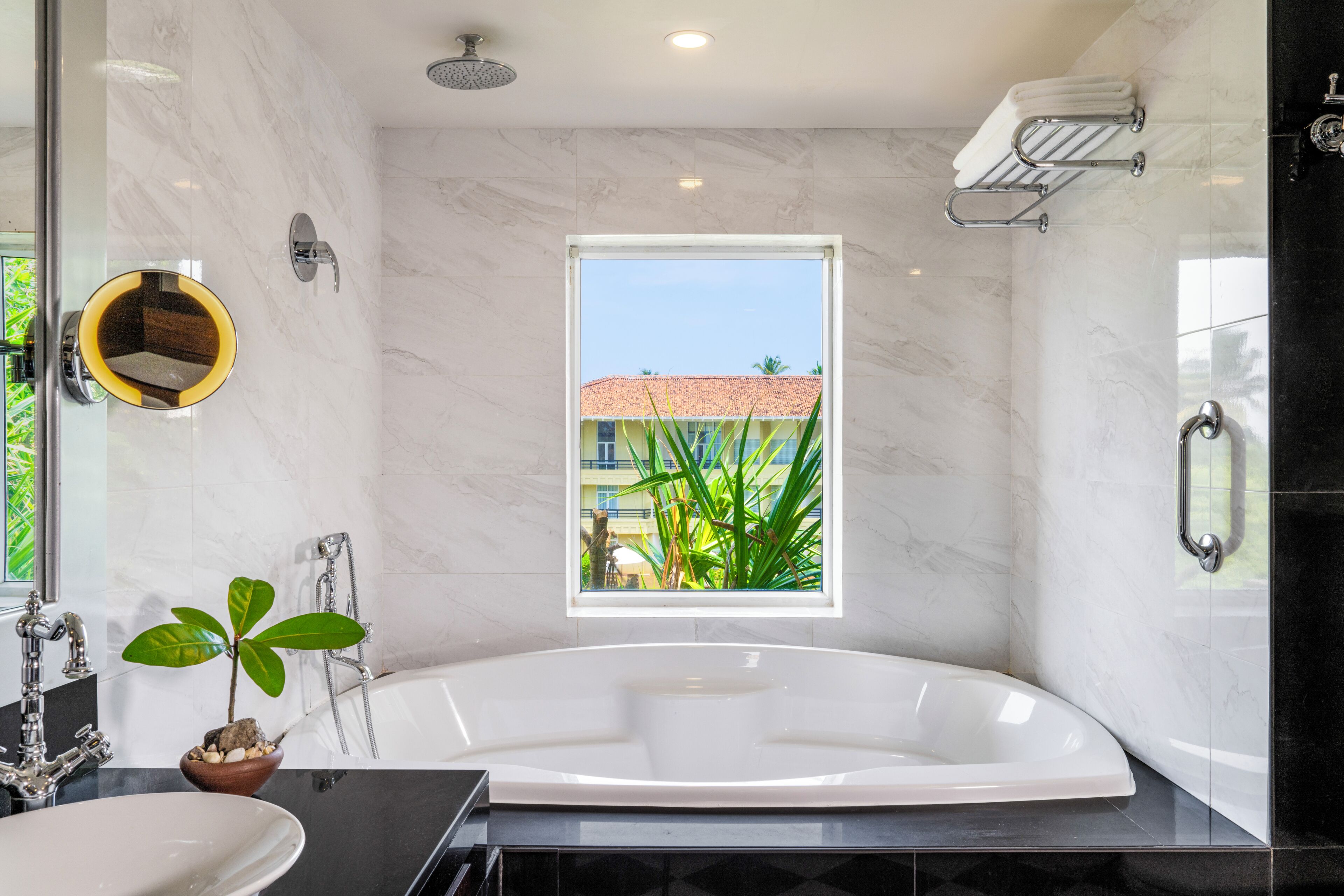 Designer toiletries, hair dryer, bathrobes, slippers