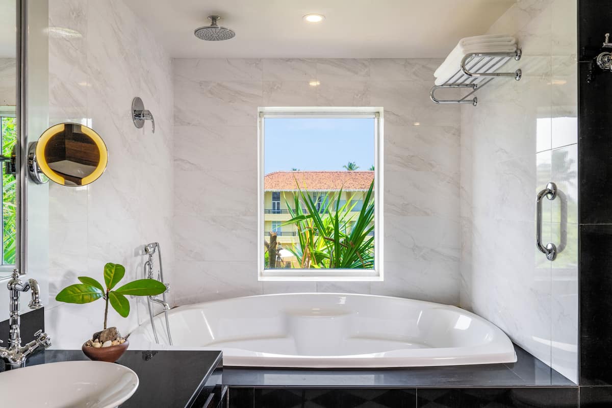 Designer toiletries, hair dryer, bathrobes, slippers