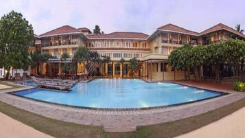 2 outdoor pools, open 8:30 AM to 7:00 PM, pool umbrellas, pool loungers