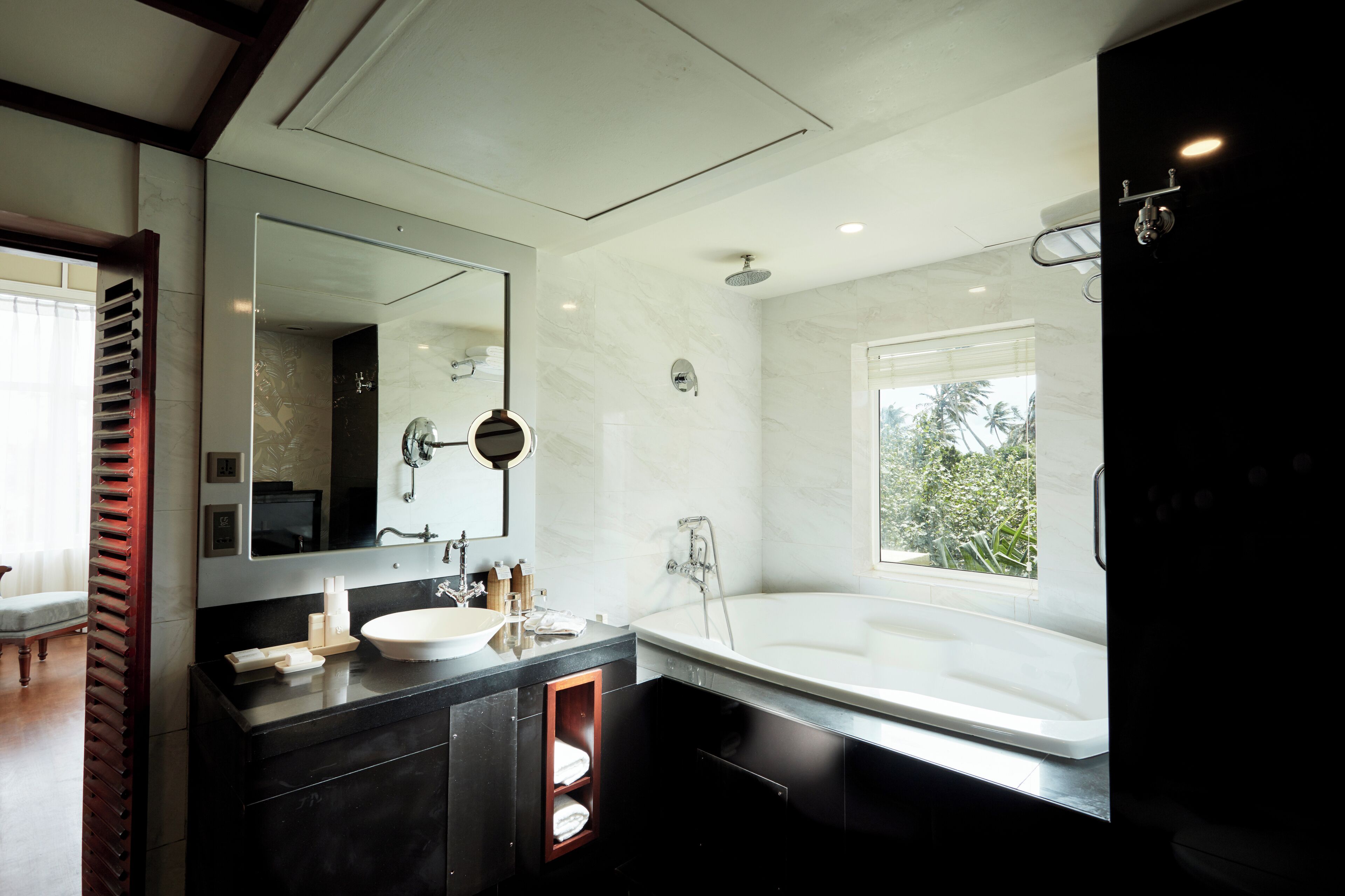 suite | bathroom | designer toiletries, hair dryer, bathrobes, slippers