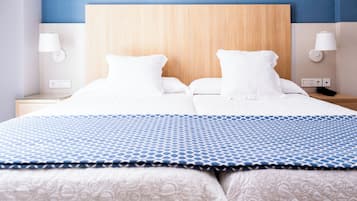 Habitación superior | Minibar, caja fuerte, escritorio y sistema de insonorización