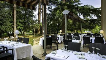Lunch, dinner served; French cuisine, garden views