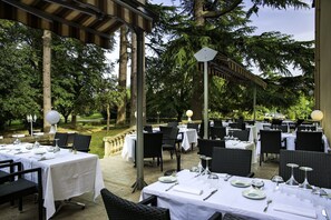 Lunch, dinner served; French cuisine, garden views