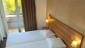 Desk, laptop workspace, free WiFi, bed sheets