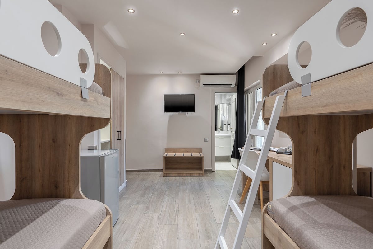 economy quadruple room | 1 bedroom, premium bedding, in-room safe, desk