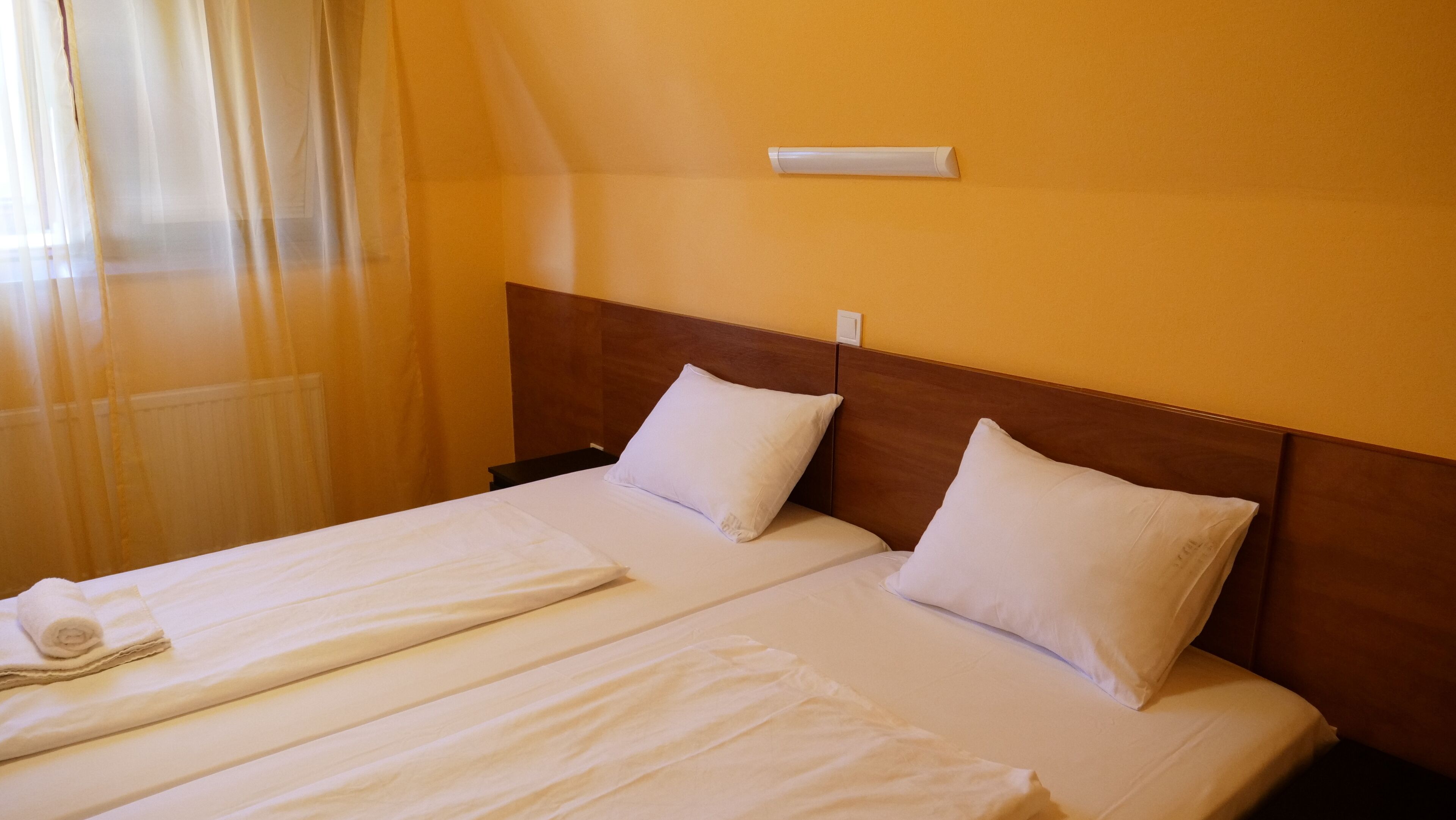 Standard Double or Twin Room | Blackout drapes, iron/ironing board, free WiFi, bed sheets