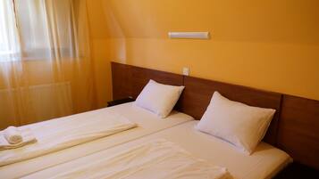Standard Double or Twin Room | Blackout drapes, iron/ironing board, free WiFi, bed sheets