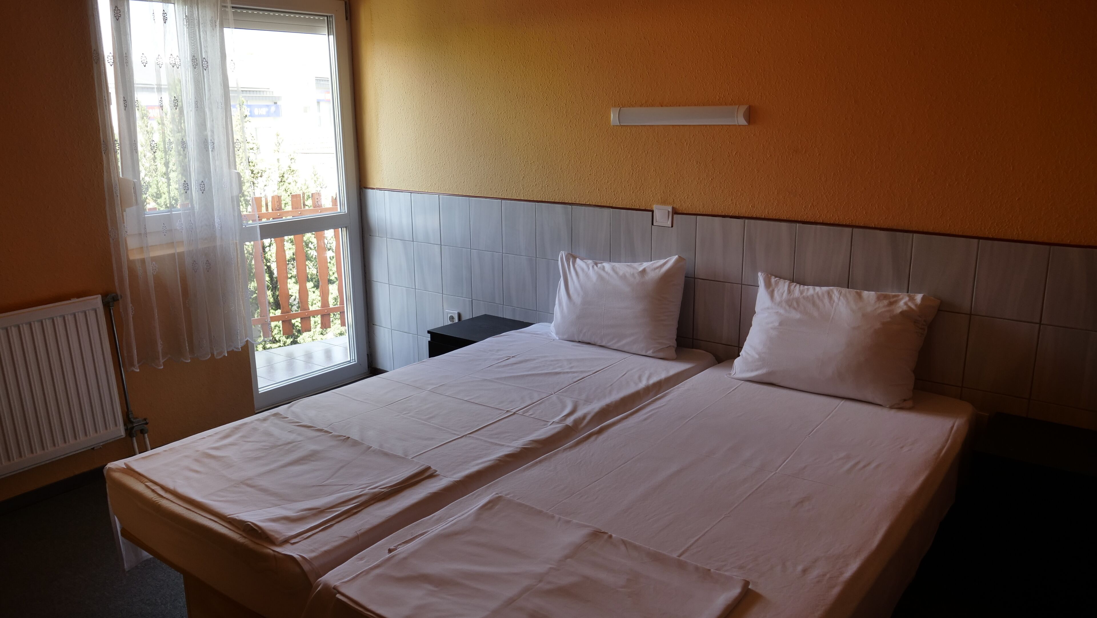 Standard Double or Twin Room | Blackout curtains, iron/ironing board, free WiFi, bed sheets