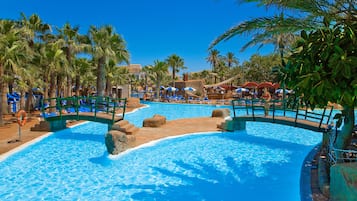 Indoor pool, outdoor pool, pool umbrellas, pool loungers